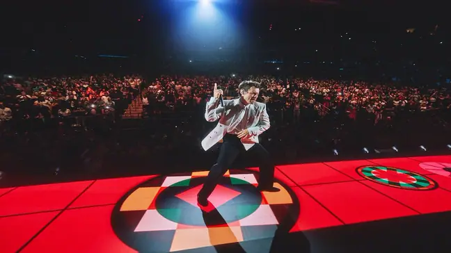 Harry Styles dancing on a red stage at MSG 2026