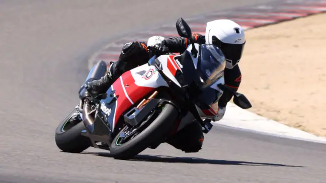 Riding the Bimota KB998 Rimini superbike on track.